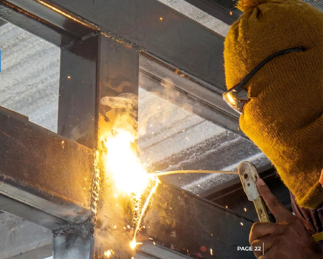 Welder working on a structural steel connection